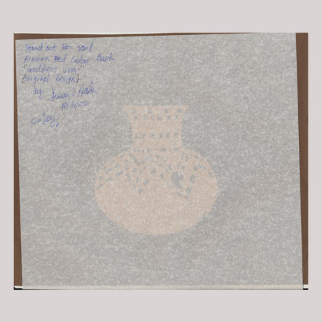 
        Tissue paper, with information about the artist.